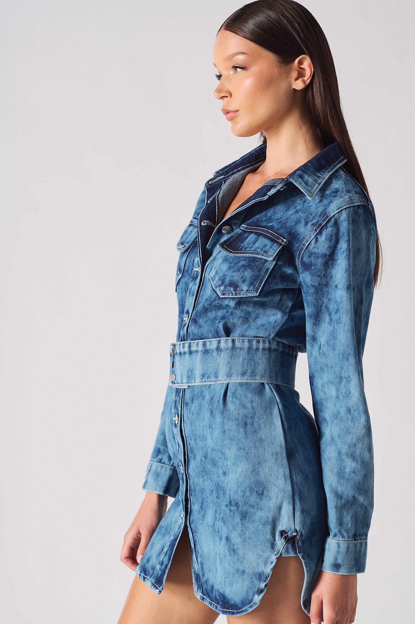 Side profile close-up of the acid wash denim dress