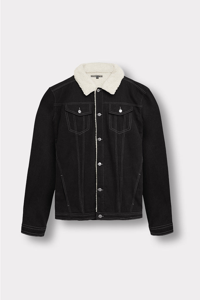 Black denim jacket with a white shearling collar and contrast stitching, laid flat.