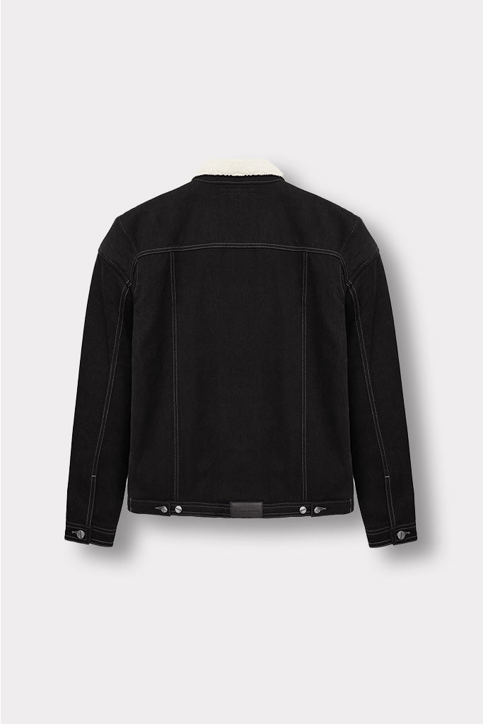 Back view of the black shearling denim jacket laid flat.
