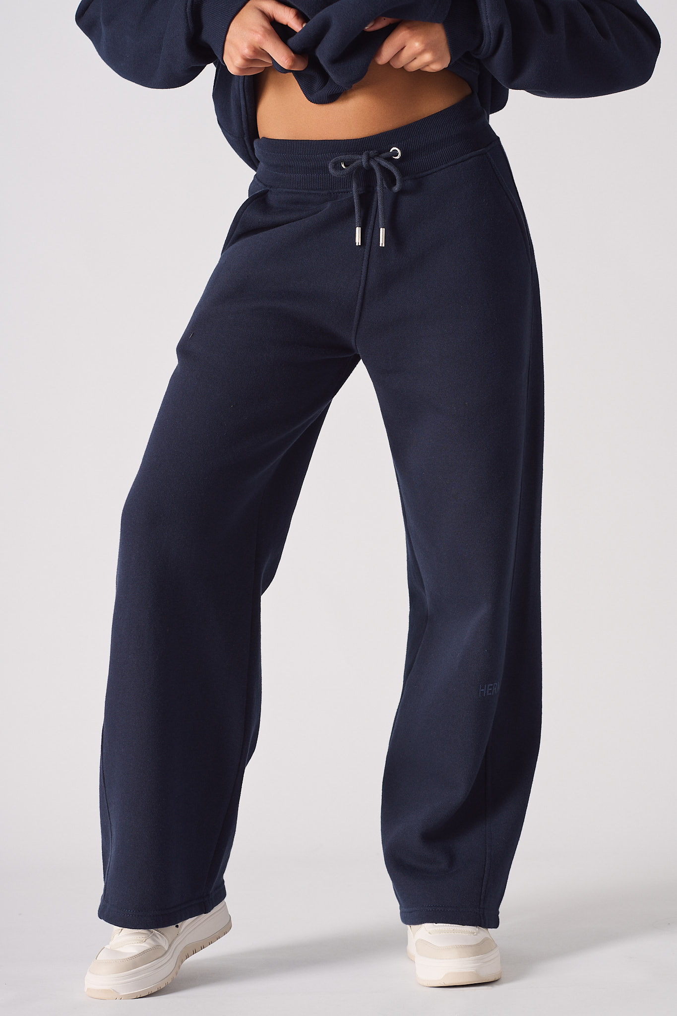 Front view of the dark navy joggers for women showing the wide-leg fit.
