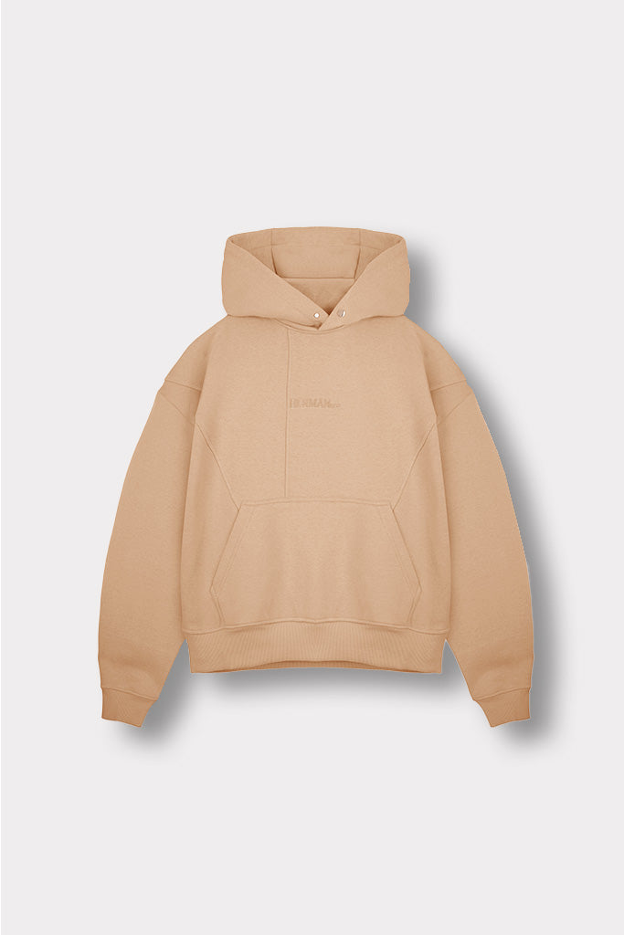 Flat lay front view of essential beige pullover hoodie men outfit staple