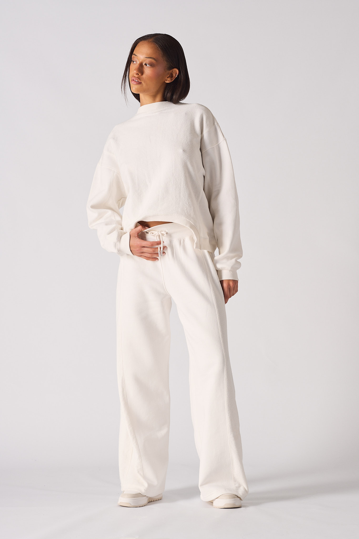 Back flat lay view of the simple white crew neck jumper womens