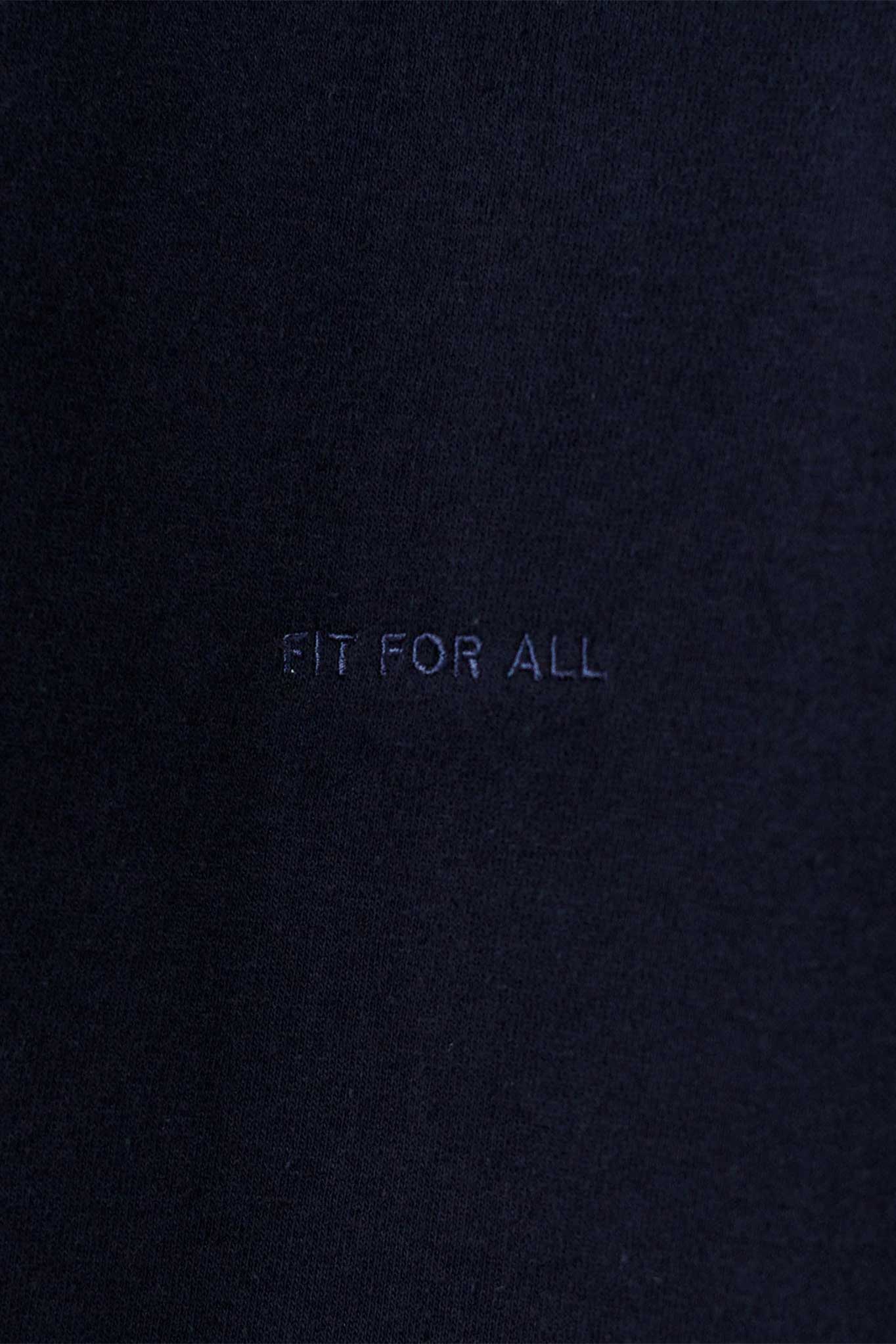 Detailed view of the tonal HERMAN logo embroidery on the chest