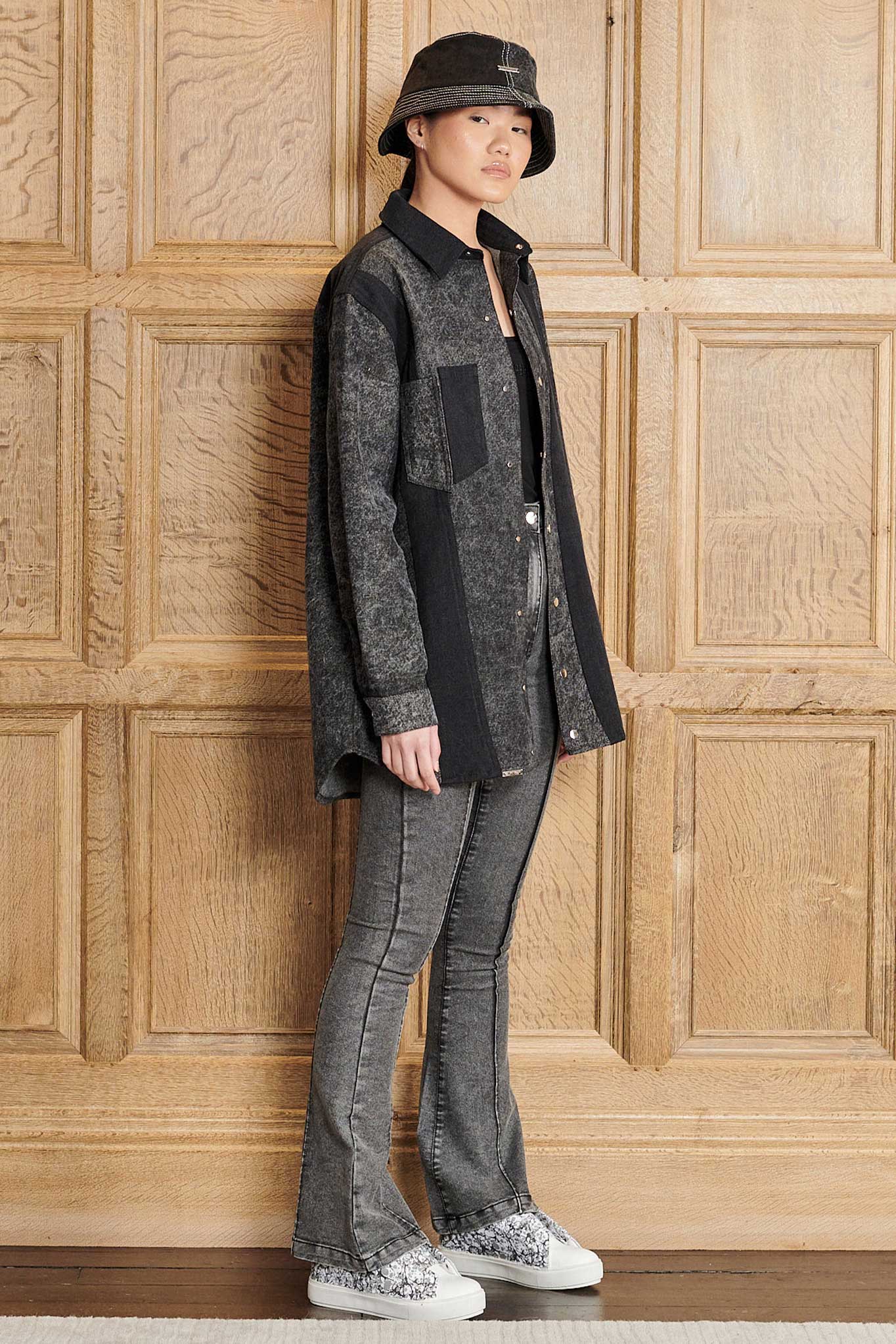 A full outfit showing how to style the acid wash bucket hat with a matching jacket