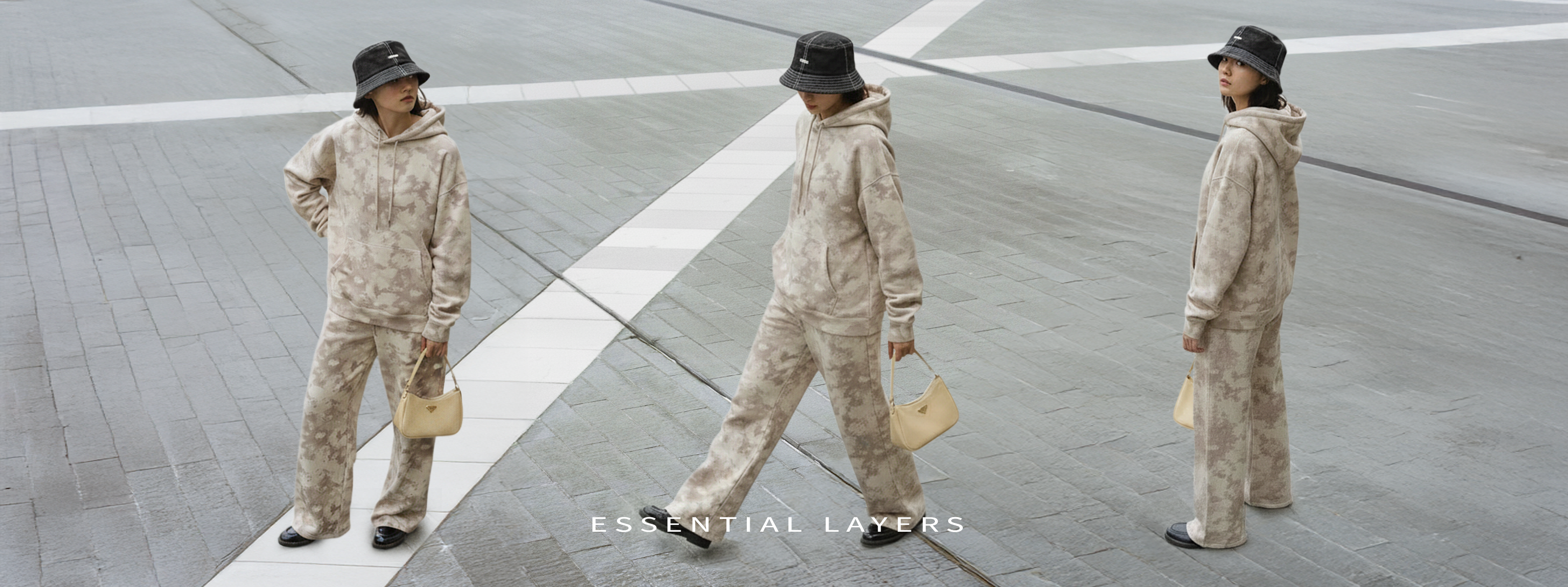 Person in camouflage outfit with a hat and bag, walking on a tiled floor.