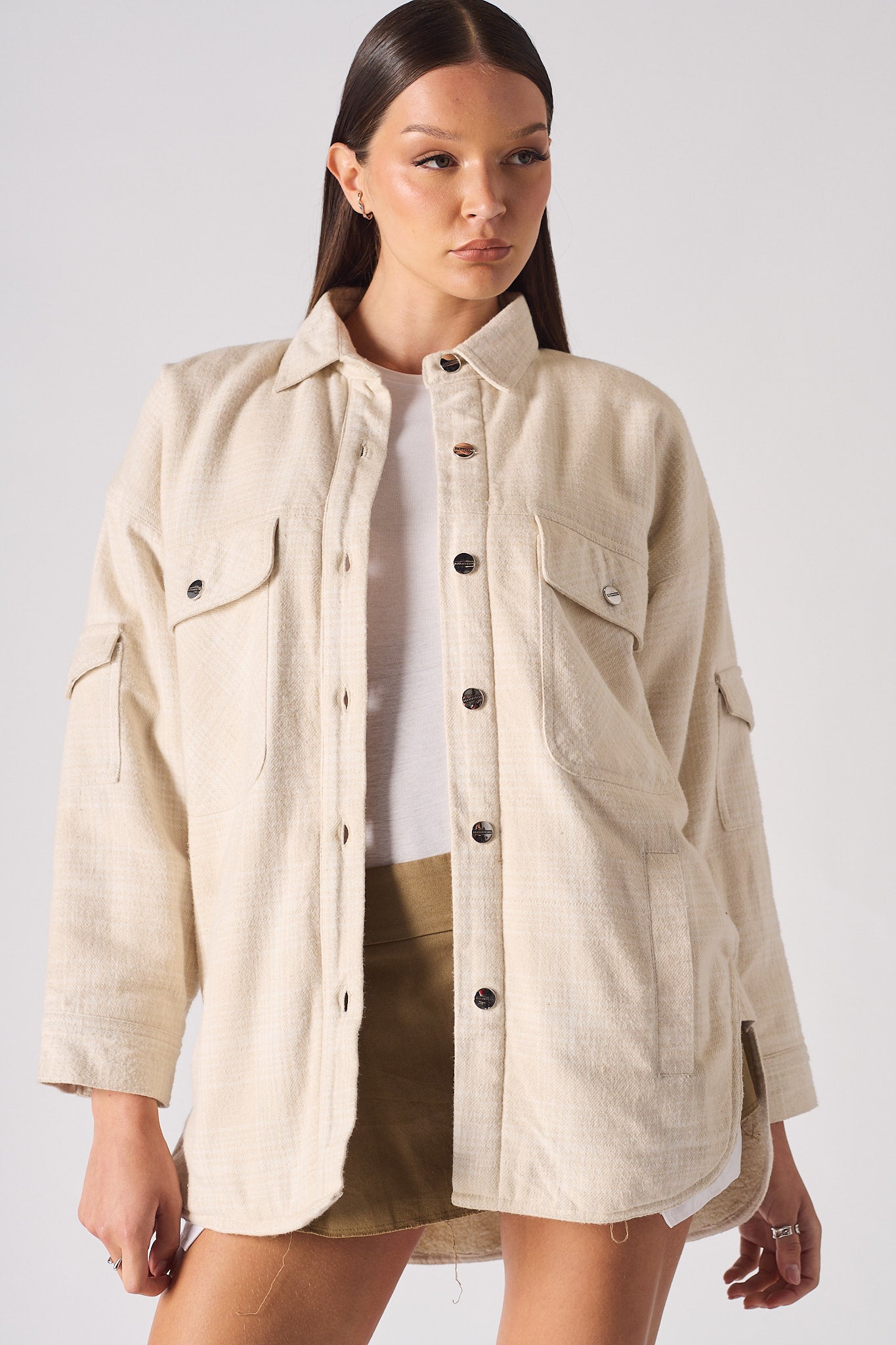 Front close-up of the beige checkered shirt for women.