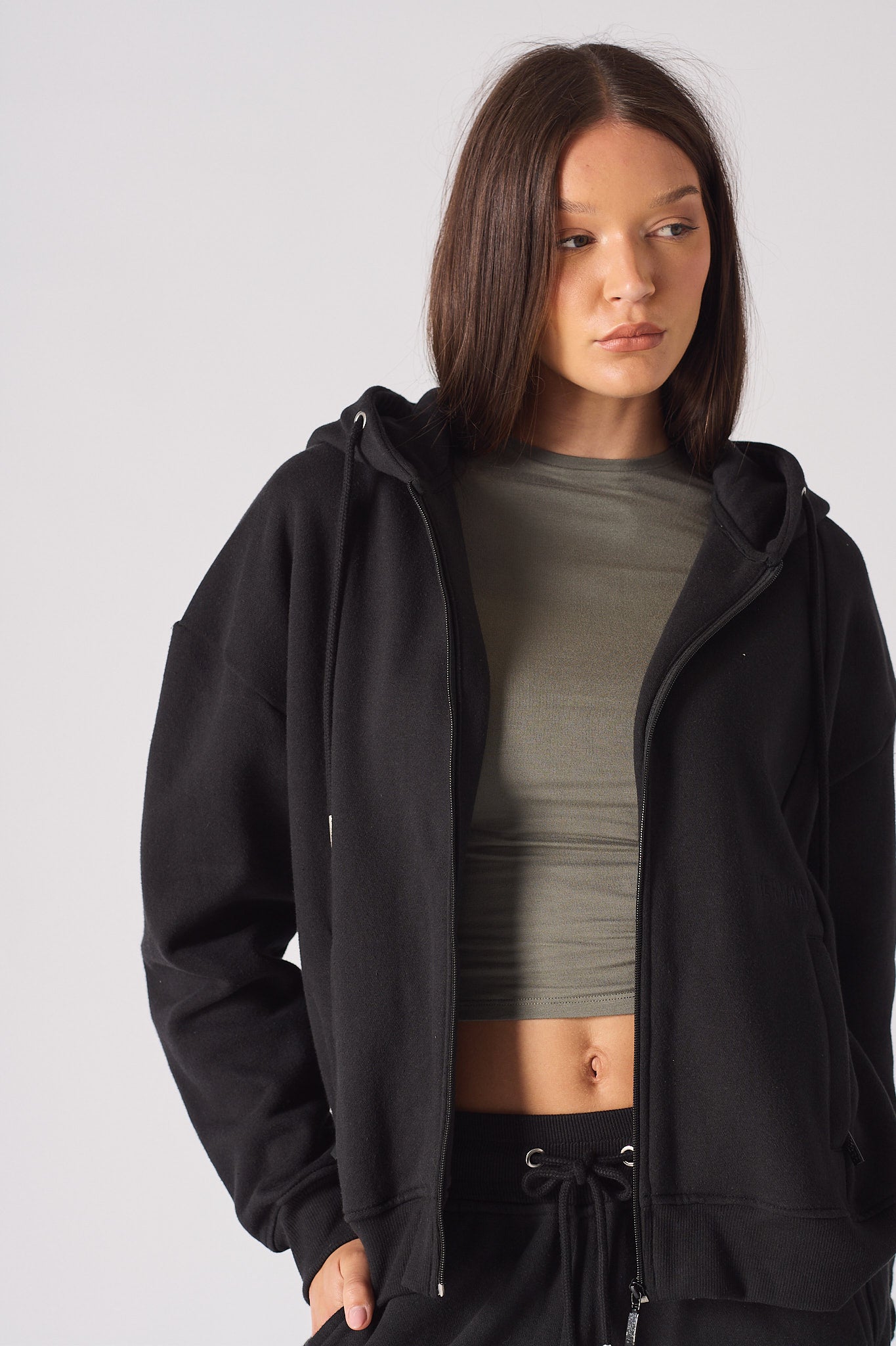 Detailed texture view of the soft fabric on black zip up hoodies for women