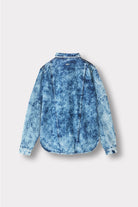 Back view of the bleach wash seam detail shirt laid flat.