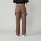 Back view of the brown wash baggy jeans for women.