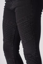 Detailed view of the ribbed biker panel on the skinny jeans for women.