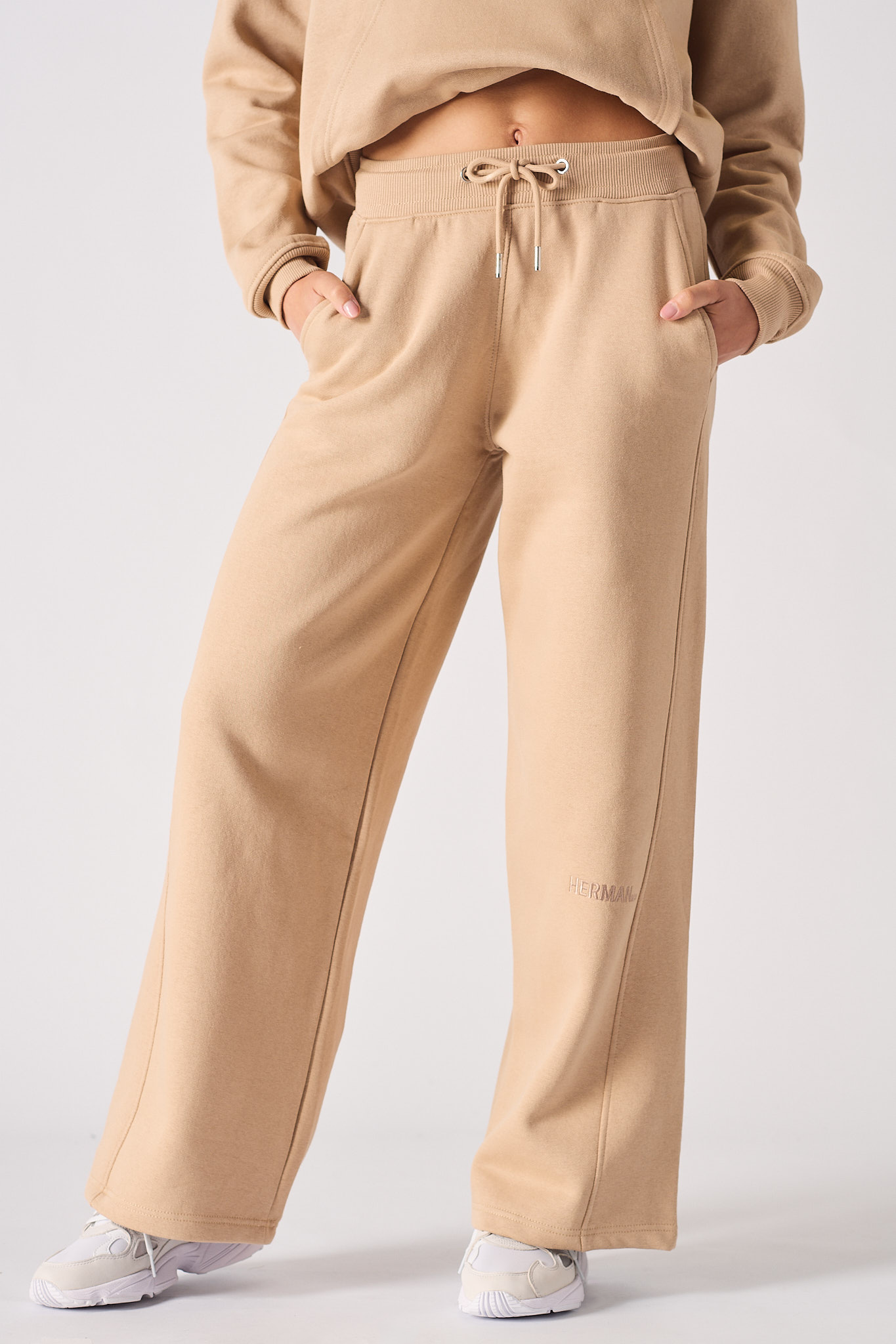 Close-up of the women's beige wide-leg joggers.