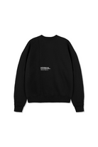Flat lay front view of essential black crewneck sweatshirt for women with chest logo