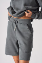 Close up detail of the side pocket on womens cool grey fleece shorts