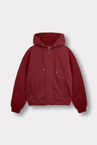Front view of the women's red zip-up hoodie laid flat.