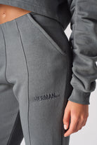 Close up texture view of the ruched fabric detail on the leg