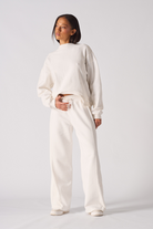 Back flat lay view of the simple white crew neck jumper womens