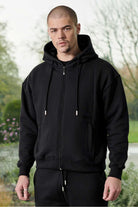 Close up detail of the side pocket on black zip up hoodie men