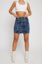 Front view of the women's blue acid wash denim skirt with a button front