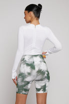 Back view of the bodysuit showing the zip detail at the neck.