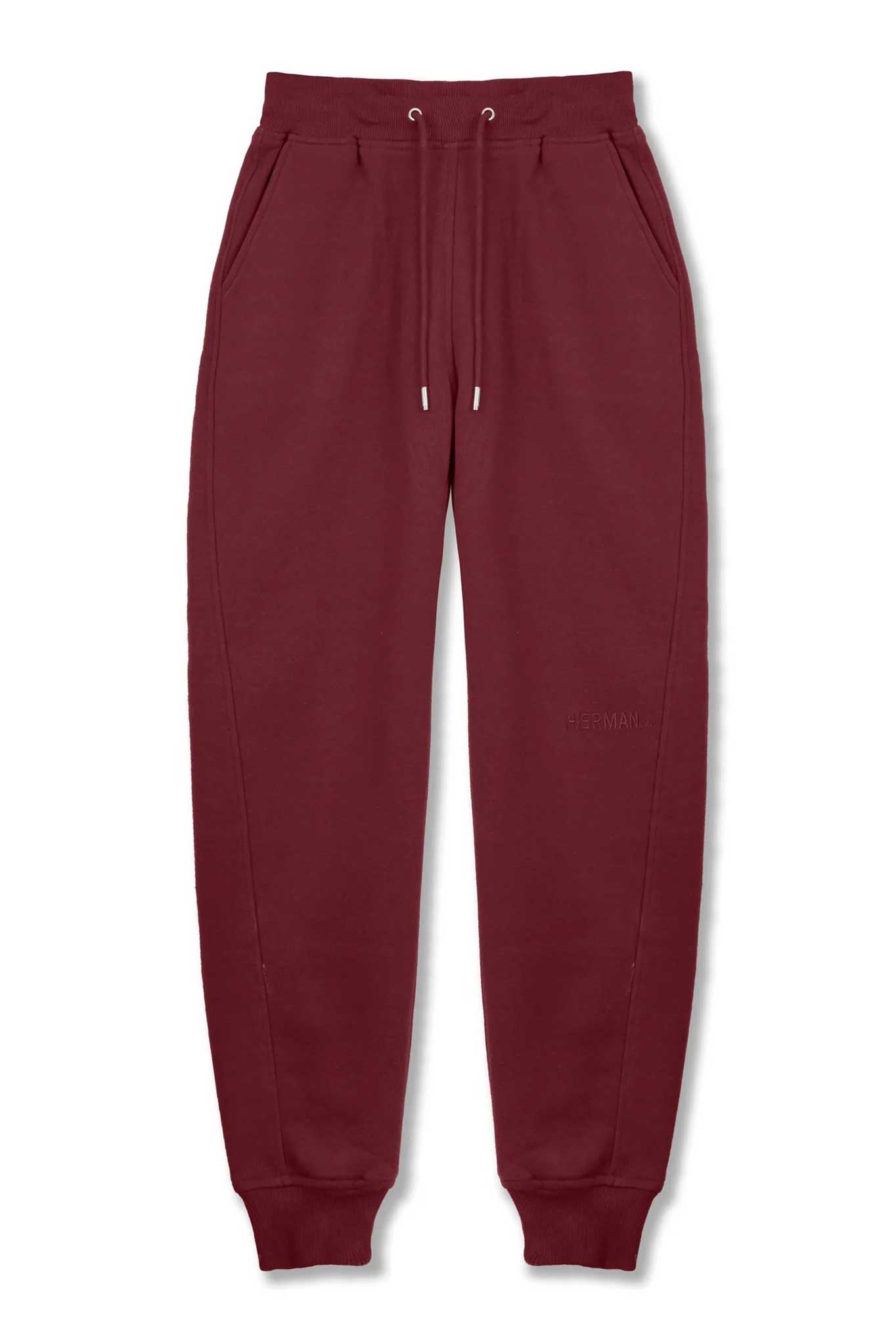 Flat lay front view of essential burgundy tapered joggers for women
