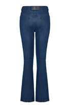 Back view of the dark wash distressed flare jeans laid flat.