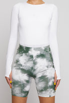 Front close-up of the green and white cycling shorts.