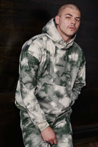 Urban streetwear look featuring a green tie dye hoodie for men