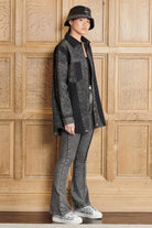 A full outfit showing how to style the acid wash bucket hat with a matching jacket