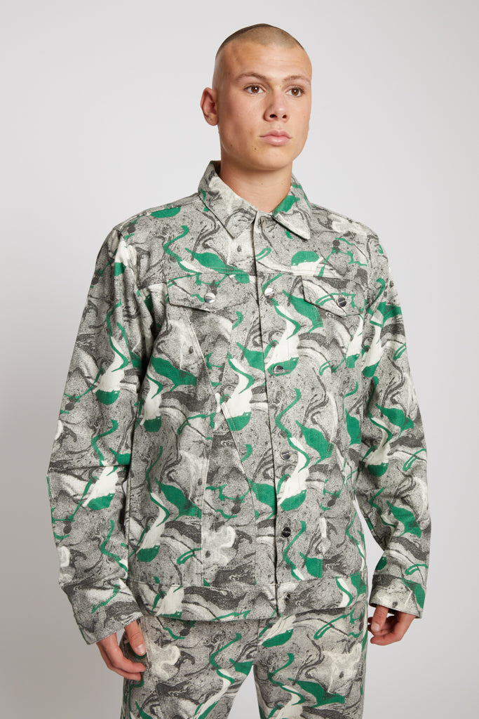 Close-up of a model wearing the men's psychedelic print collared jacket.