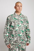 Close-up of a model wearing the men's psychedelic print collared jacket.