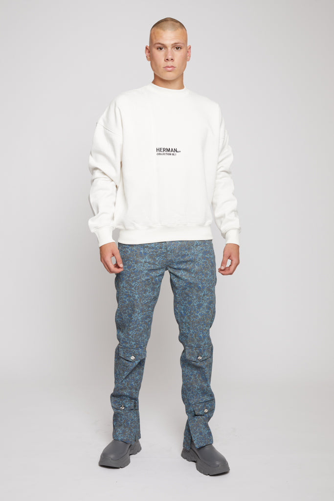Full length model shot wearing white fleece crewneck sweatshirt mens with grey jeans