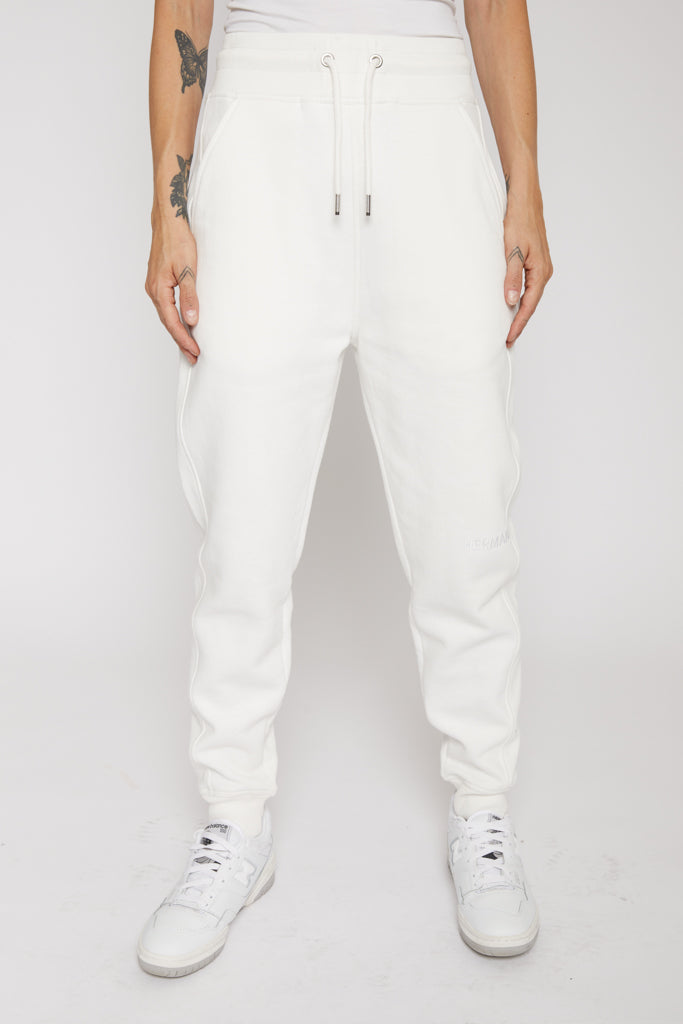 Front view of the men's white tapered joggers showing the tapered fit.