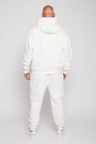 Rear view showing the fit of the mens white zip up hoodie