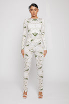 Front view of a model wearing the full printed dipped waistband leggings outfit.