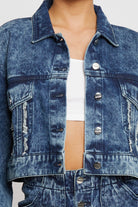 Another view of the wide sleeve detail on the short sleeve cropped denim jacket.