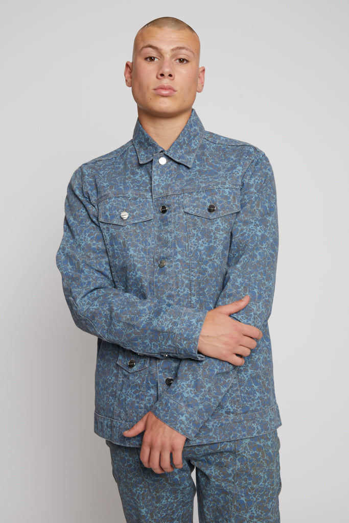 Close-up of a model wearing the speckled print jacket for men