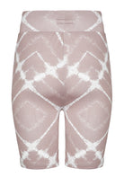 Back view of the white and taupe cycling shorts laid flat.