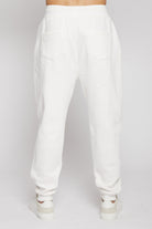 Back view of the men's white tapered joggers.