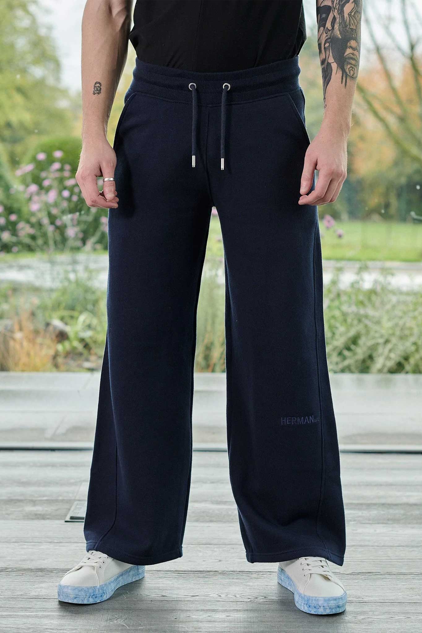 Front view close-up of the men's wide-leg navy joggers.