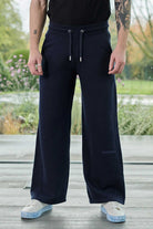 Front view close-up of the men's wide-leg navy joggers.