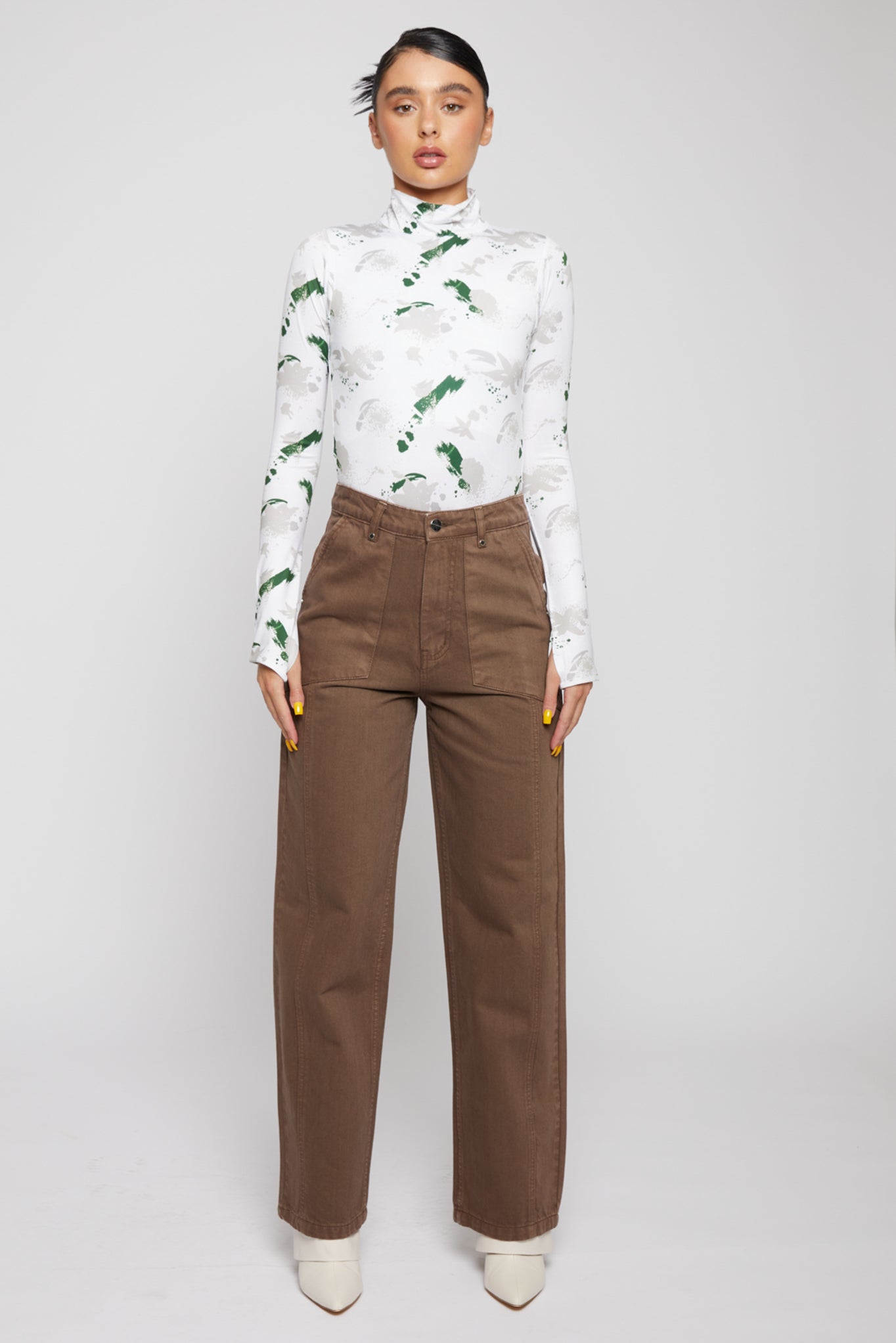 Front view of a model in the women&#39;s brown wash wide-leg jeans.