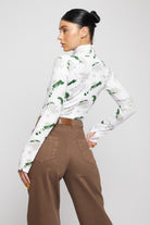 Angled back view of the women's brown wide-leg jeans.