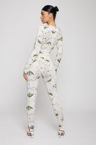 Full back view of a model in the women's dipped waist leggings.