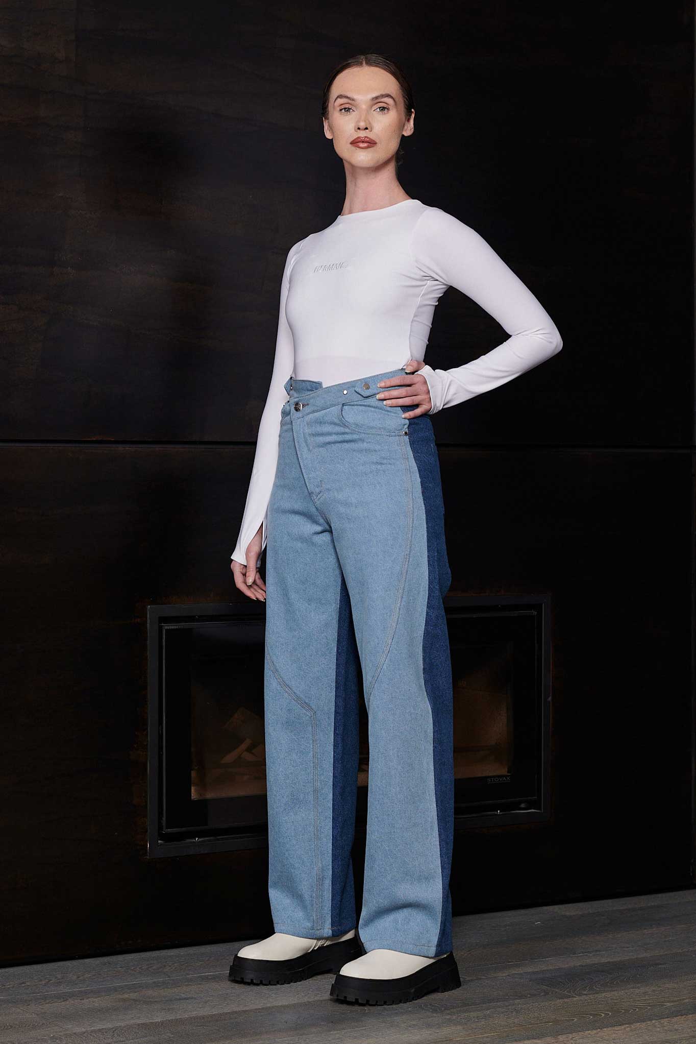 Front view of a model styled in the women's half wash baggy jeans.