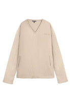 Flat lay front view of essential womens beige v neck jumper