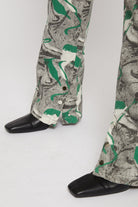 Close-up of the hem on the women's printed jeans.