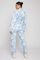 Back view of a model wearing the women's psychedelic denim jacket.